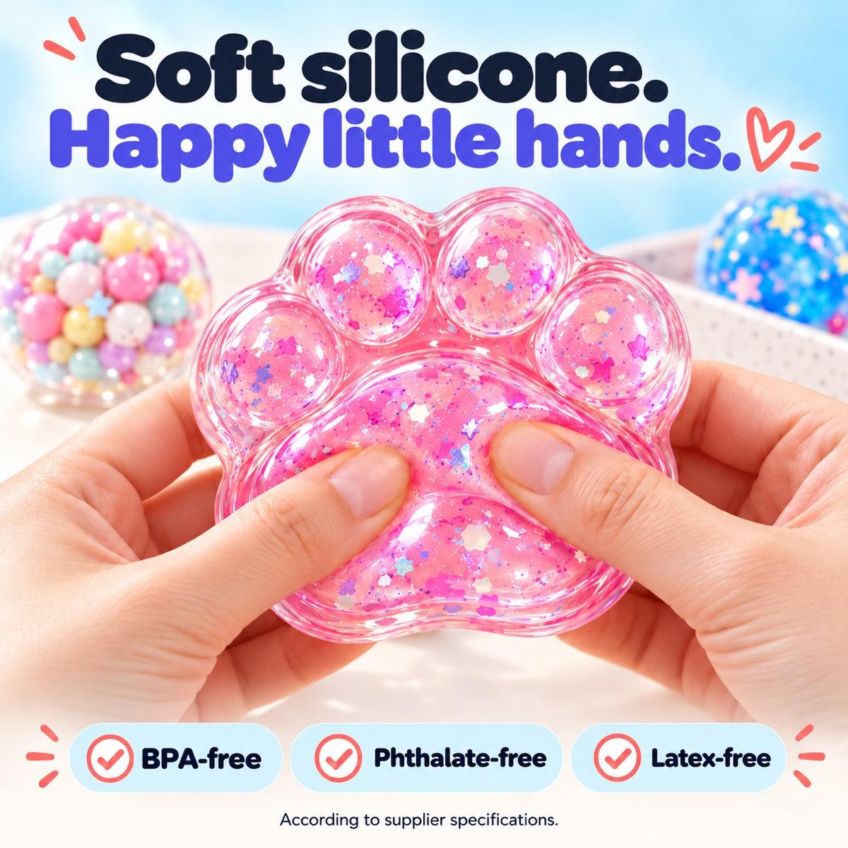 Hands gently squeezing a pink silicone paw squishy; BPA-free, phthalate-free and latex-free.